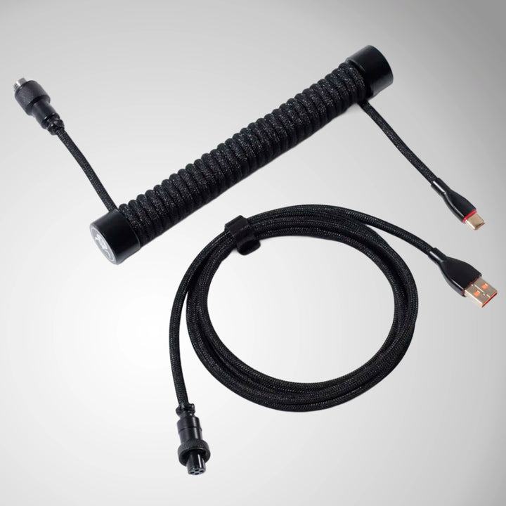 Cable USB-C GravaStar negro trenzado y enrollado con conector aviador para teclado mecánico