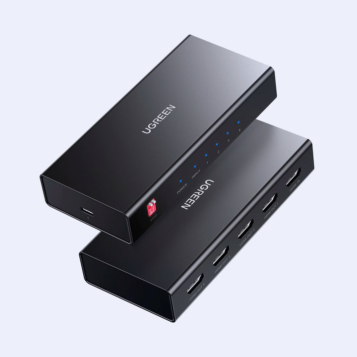 Splitter HDMI UGREEN CM570, adaptador de 1 entrada a 4 salidas 4K@60Hz, visible en la imagen.
