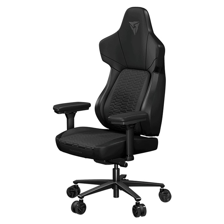 Silla gamer ThunderX3 Core Racer negra con diseño ergonómico y respaldo alto, ideal para largas sesiones de juego.