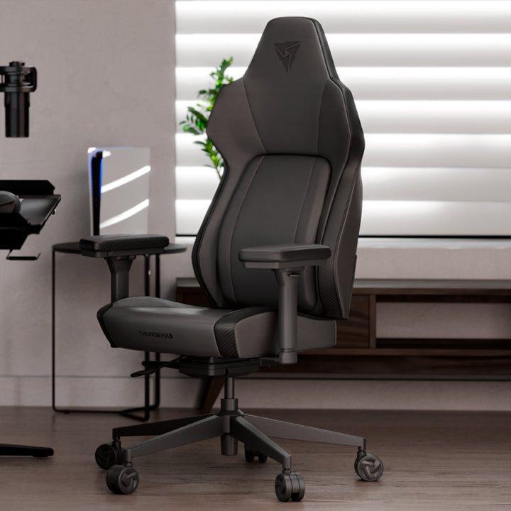 Silla gamer ThunderX3 CORE SMART en negro con diseño moderno, soporte ergonómico y detalles en la imagen.