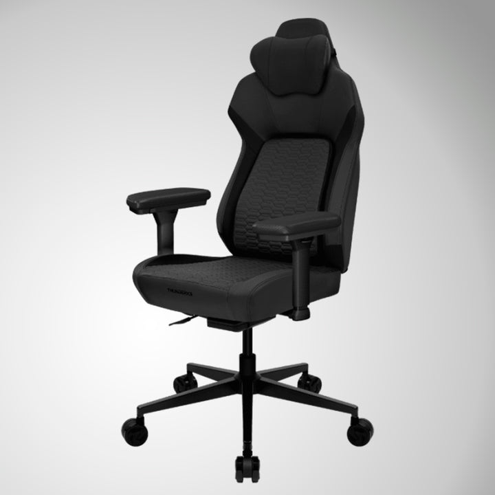 Silla gamer ThunderX3 CORE SMART negra con diseño ergonómico y respaldo alto, ideal para largas sesiones de juego.